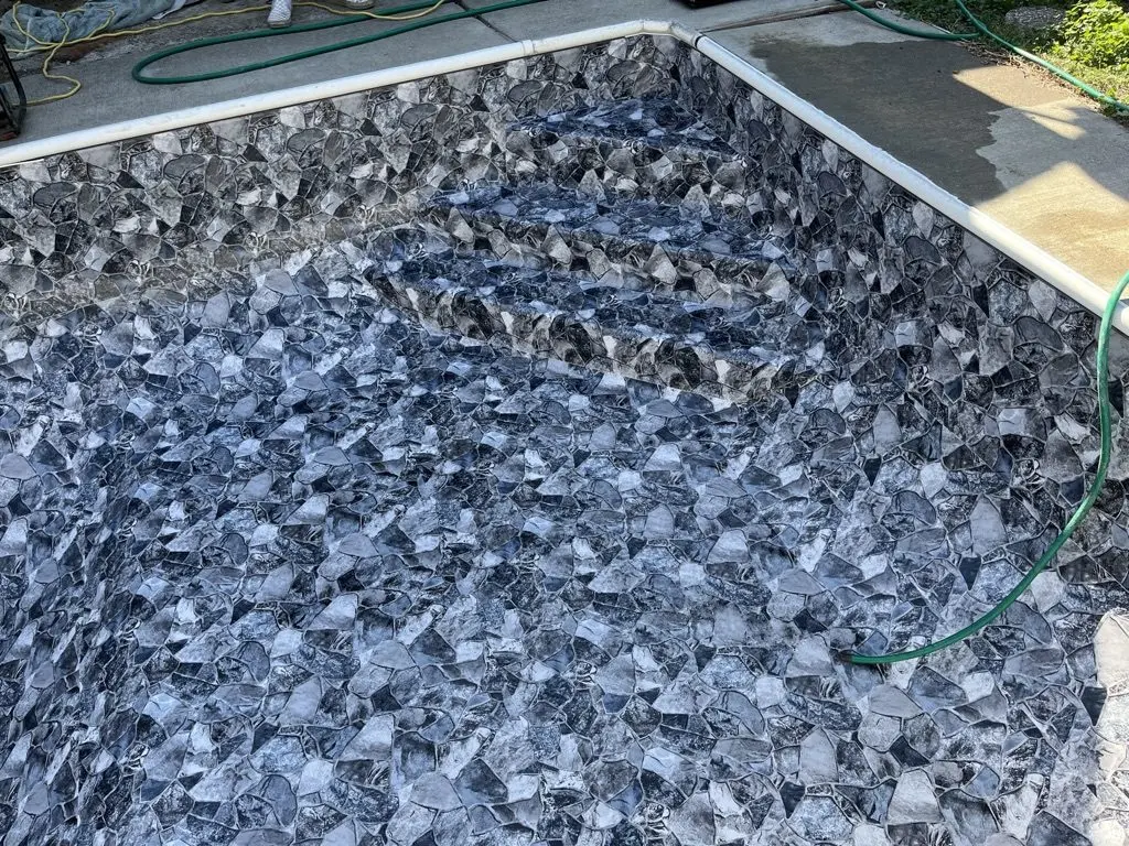 Project 1: the new stone-pattern liner fitted over the floor and the new steps