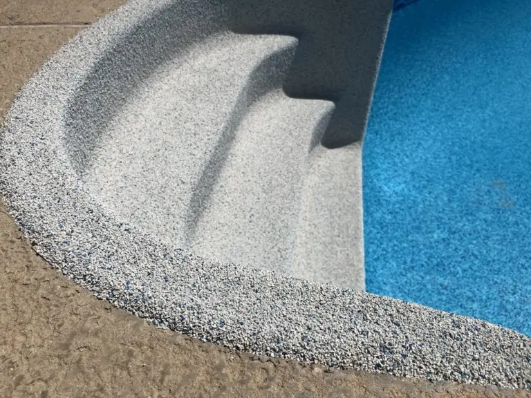 Close-up of curved Rebound-coated steps: the slip-resistant texture against the blue liner