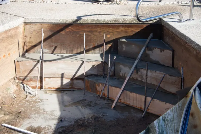 New concrete steps poured, the forms stripped away