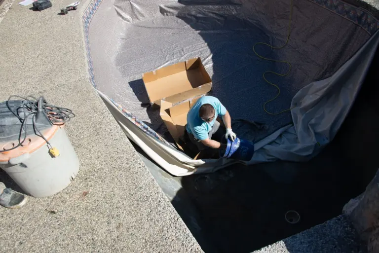Working the liner into place around the steps